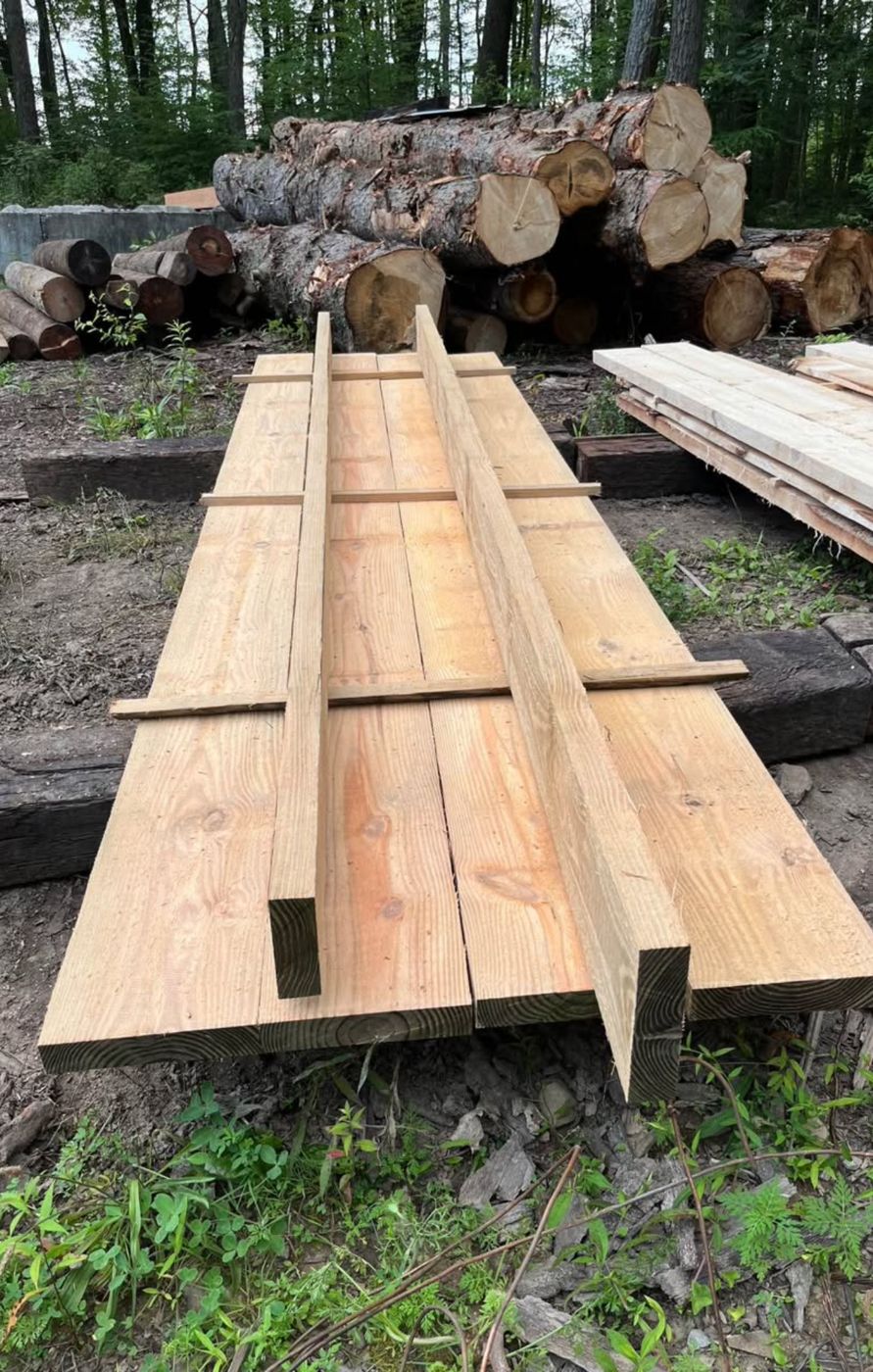 Freshly sawn lumber boards